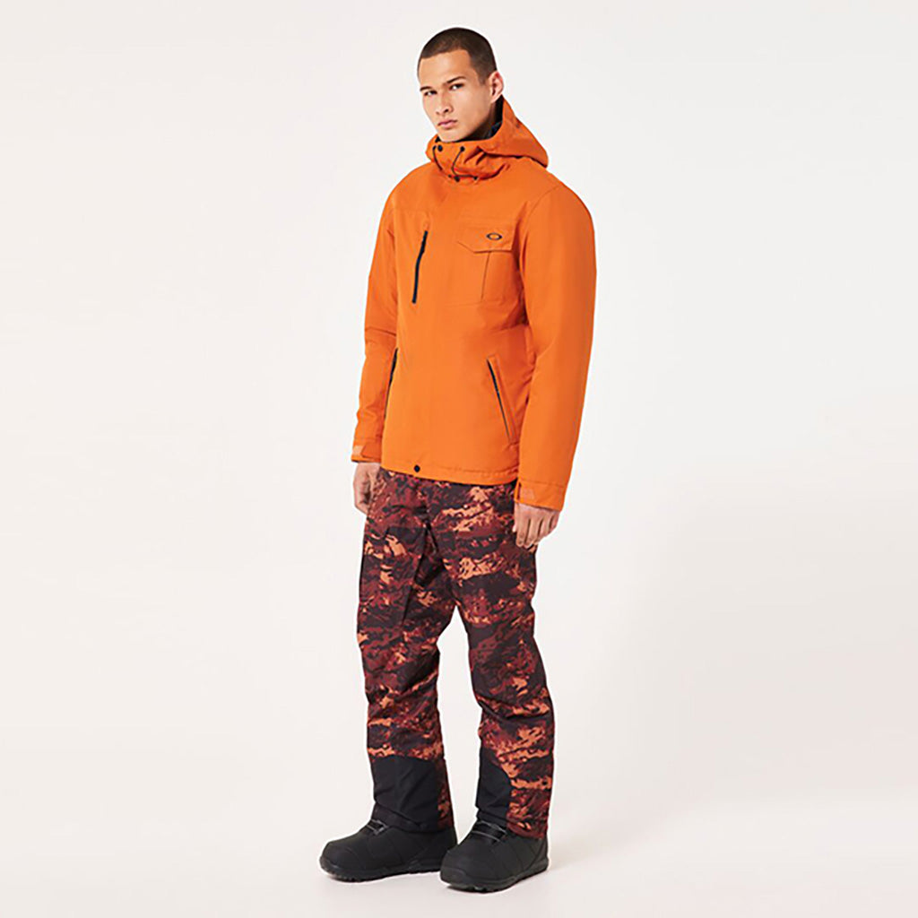 En Skijakke, Core Div. RC Insulated i farven Ginger set fra en skrå vinkel