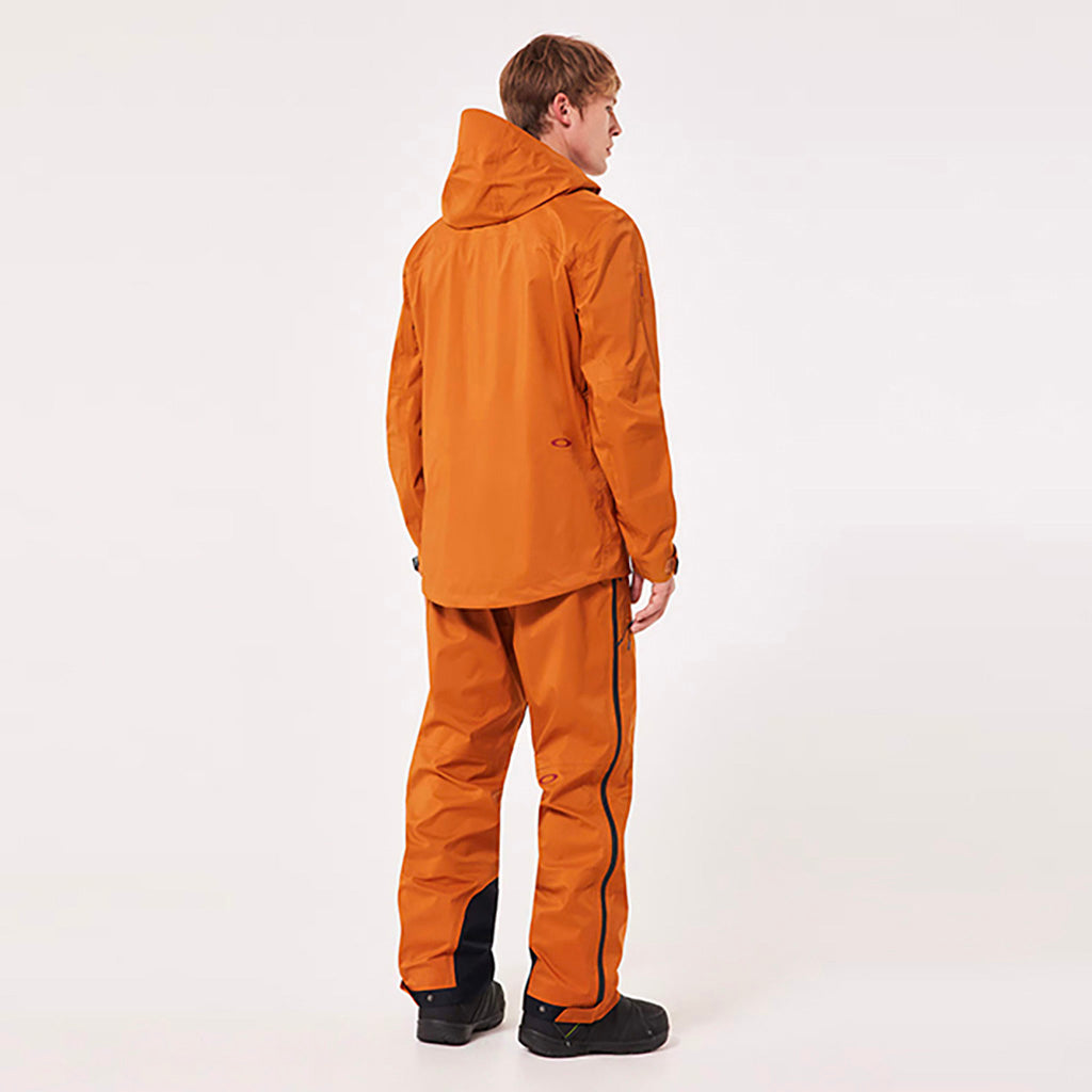 En Skijakke, TC Outpost RC Shell i farven Ginger set bagfra