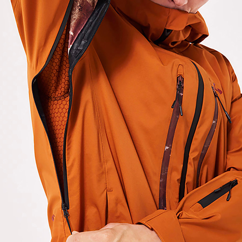 En Skijakke, TC Outpost RC Shell i farven Ginger detalje