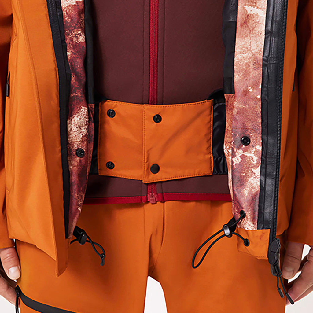 En Skijakke, TC Outpost RC Shell i farven Ginger detalje