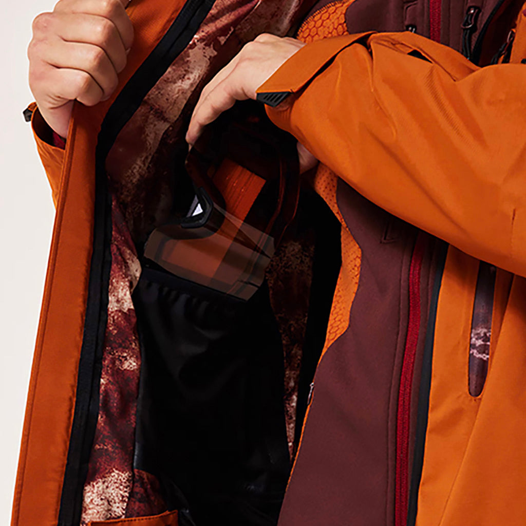En Skijakke, TC Outpost RC Shell i farven Ginger detalje