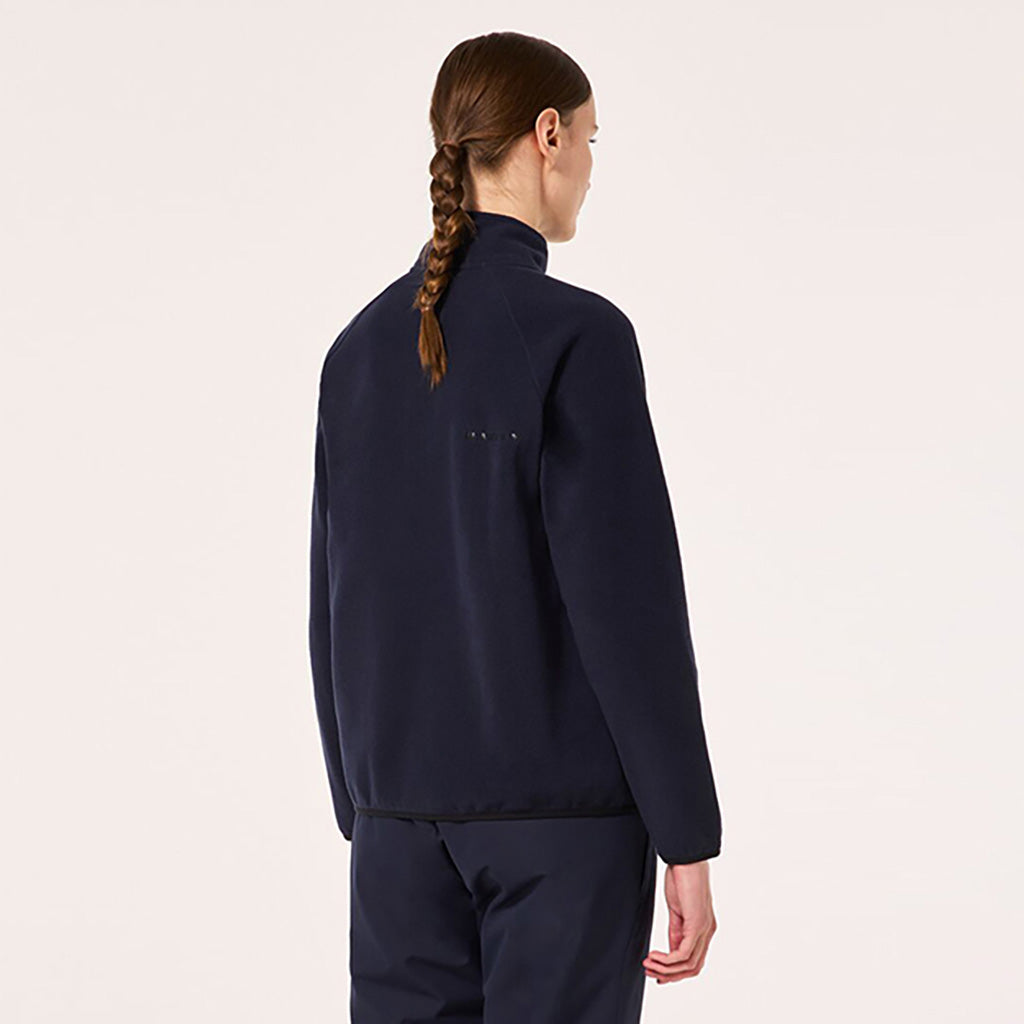 En Fleece, Ridge ½ Zip i farven Fathom set bagfra