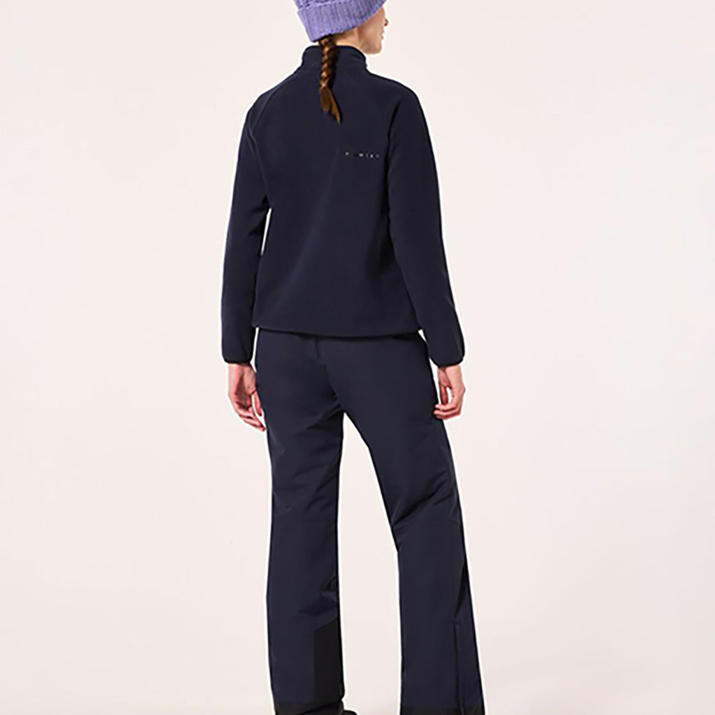 En Fleece, Ridge ½ Zip i farven Fathom set bagfra