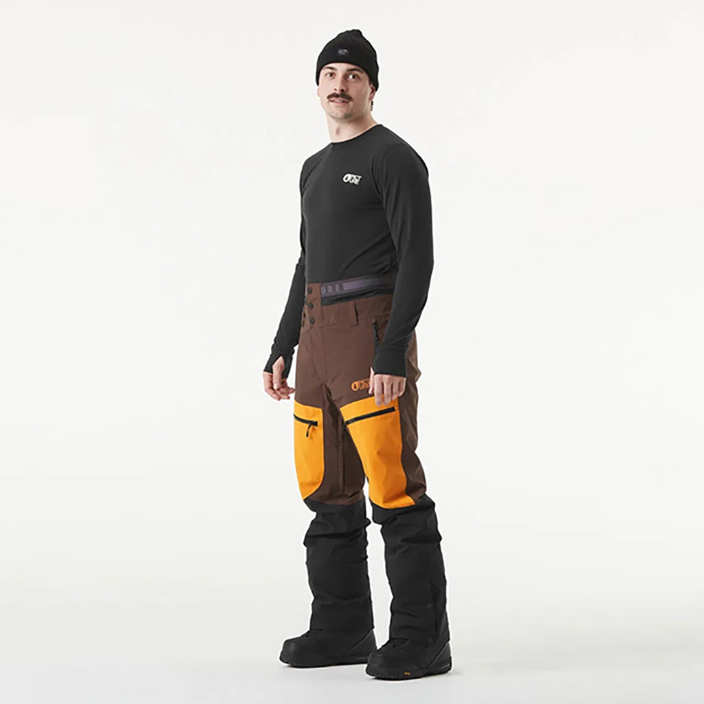 Naikoon Skibukser i farven Chicory Acid Cedar Wood set fra en skrå vinkel
