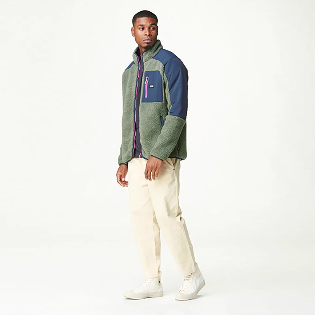 Quilchena Zip Fleece Midlayer i farven grøn Spray Dark blå set fra en skrå vinkel