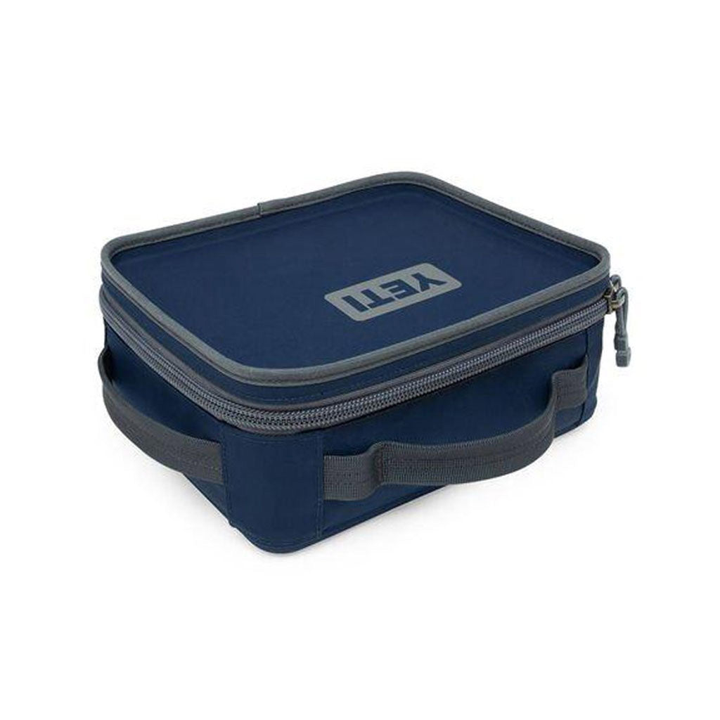 Daytrip Lunch Box i farven Navy set fra en skrå vinkel